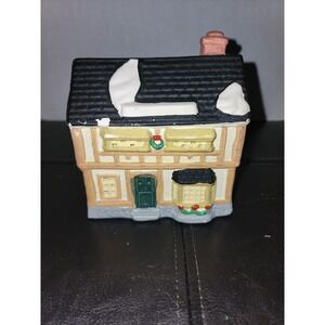 Yellow Christmas House Dark Shingle Roof